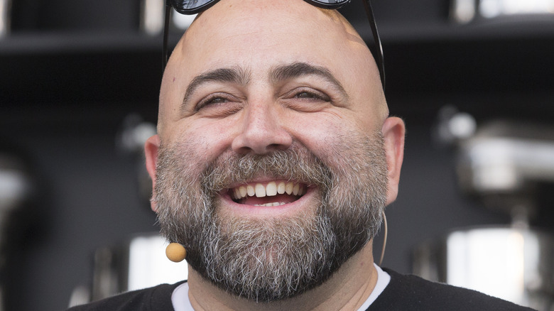 Duff Goldman smiling with sunglasses on head