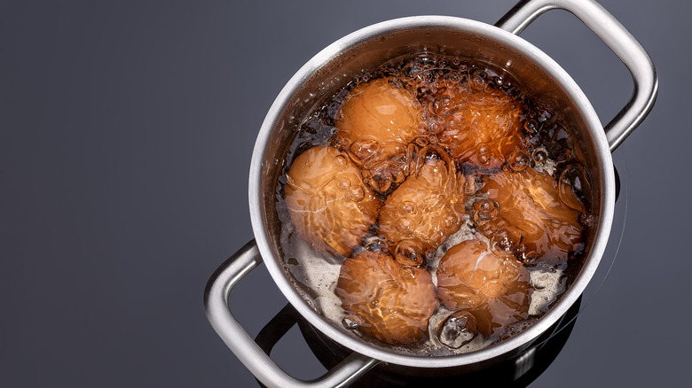 eggs boiling in pot