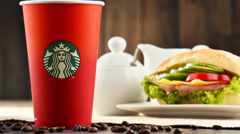 Starbucks cup and sandwich