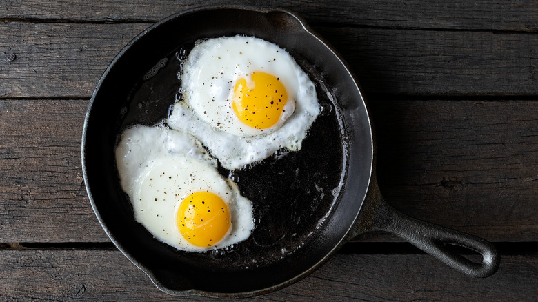 fried eggs in skillet