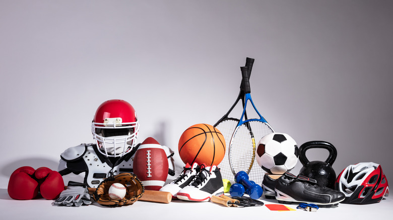 Bunch of sports gear on gray background