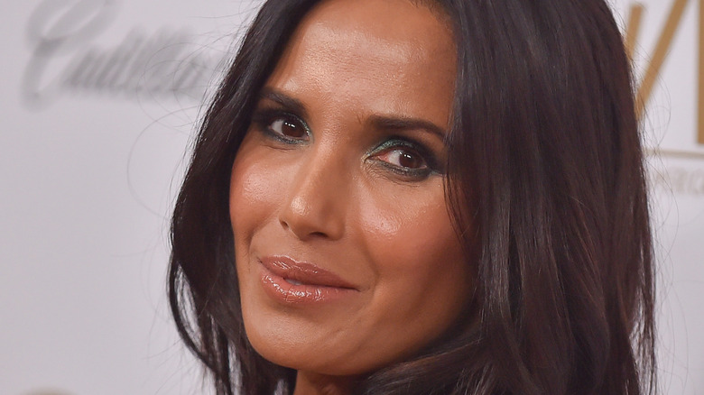 Padma Lakshmi looking over shoulder