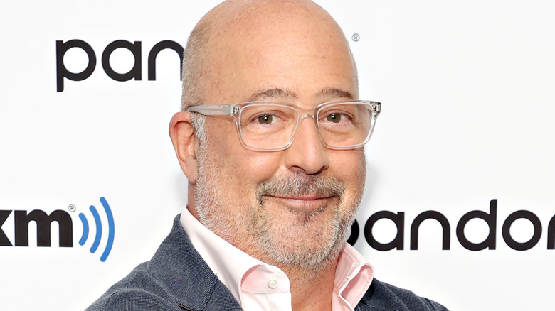 Andrew Zimmern smiling