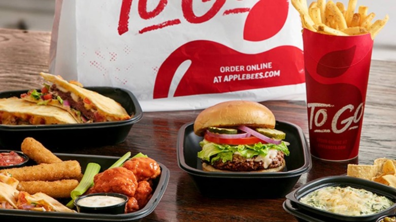 selection of Applebee's entrees on wood table