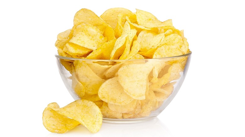 Potato chips in glass bowl