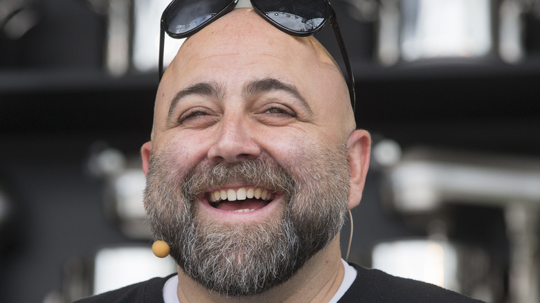 Close up of Duff Goldman laughing in sunglasses