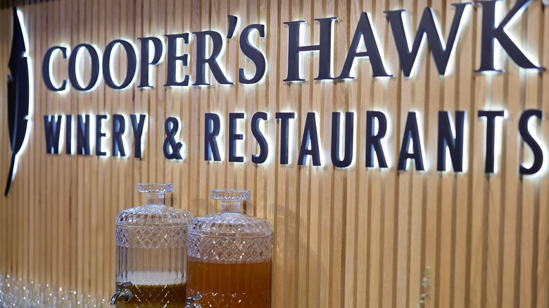 A sign for Cooper's Hawk Winery & Restaurants