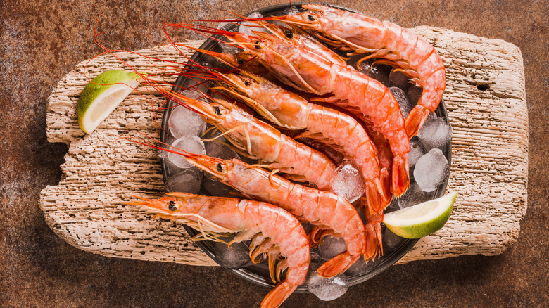 Prawns on wooden board