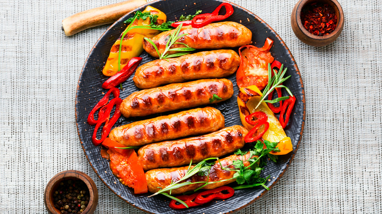 Grilled sausages on plate 