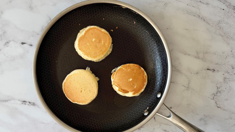 Cooked pancakes in pan