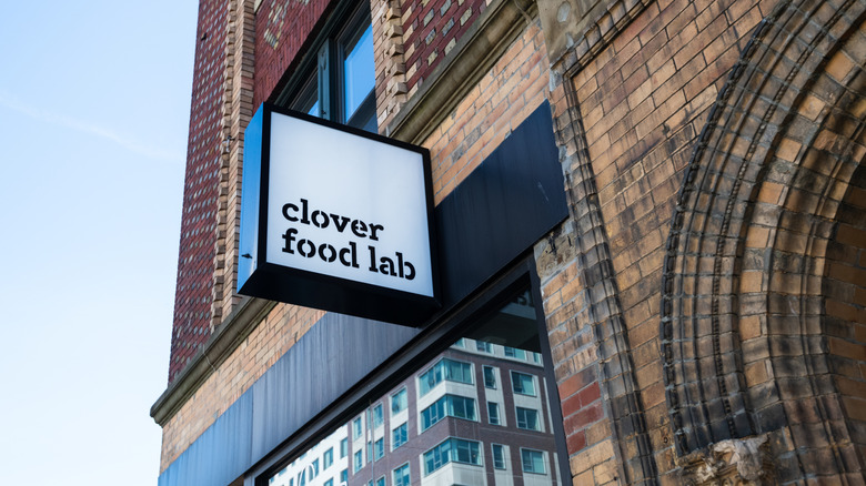 Outdoor building signage for Clover Food Lab