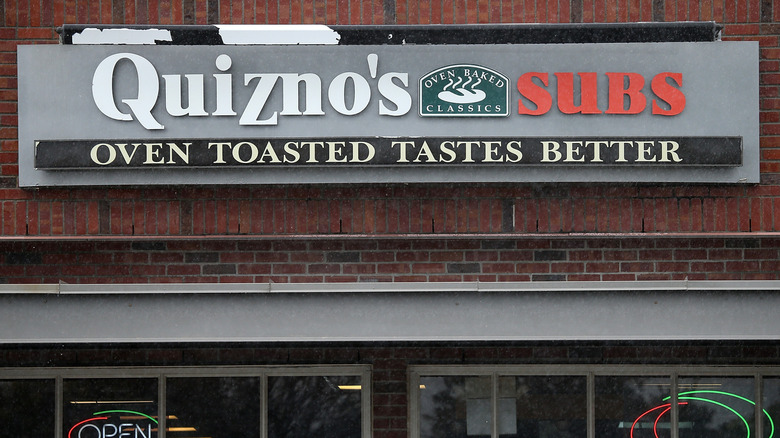 Close-up of the overhead sign of a Quiznos