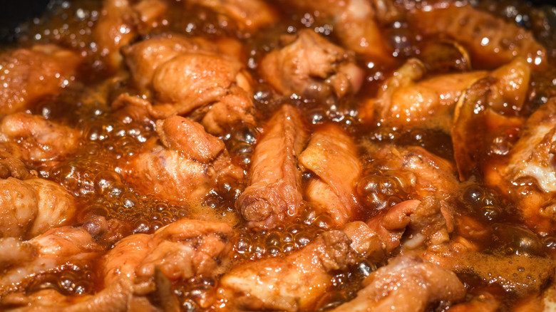 Chicken cooking in Coca-Cola