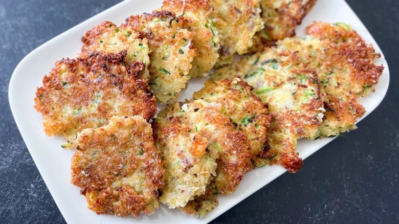 Zucchini fritters on plate