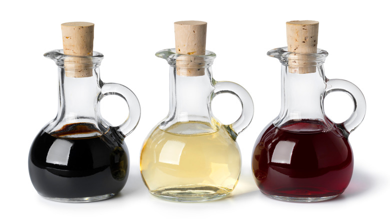 Glass bottles filled with vinegars