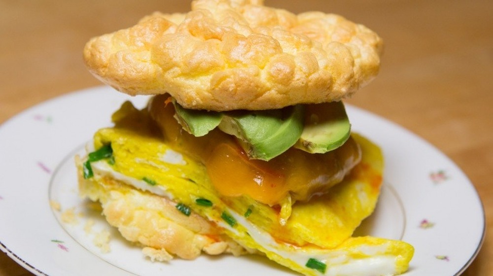 cloud bread breakfast sandwich on white plate