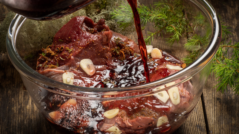 Marinade pouring on beef