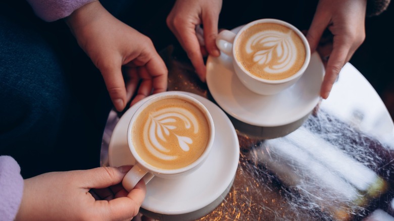 Two cups of coffee in white mugs
