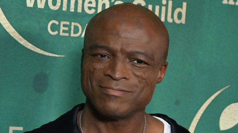 Singer Seal smiling for cameras at publicity event