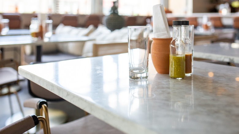 Empty glass on restaurant table