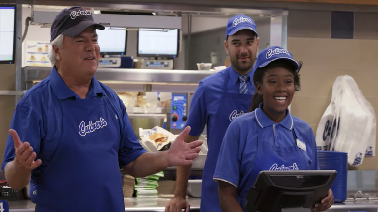 Culver's staff smiling while serving customers