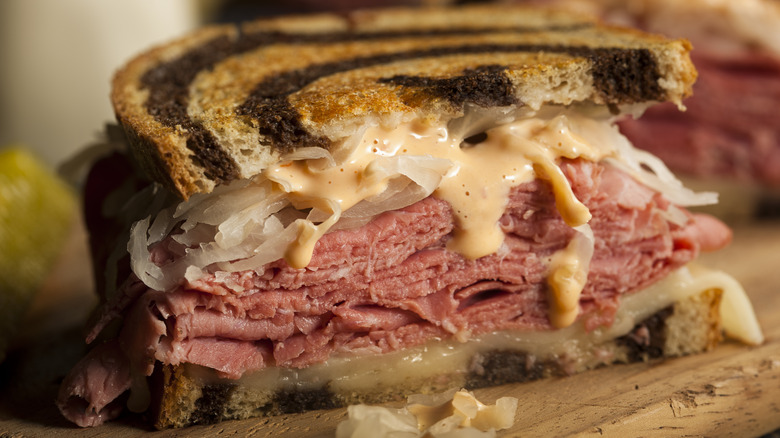 Reuben sandwich served on marbled pumpernickel bread