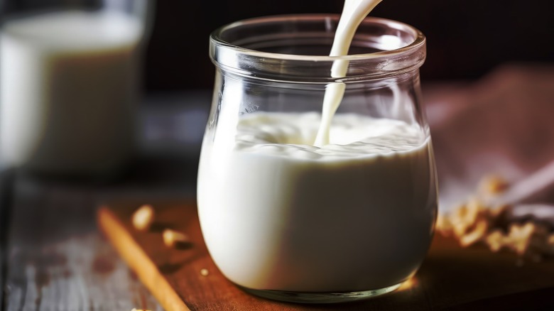 Pouring buttermilk into glass