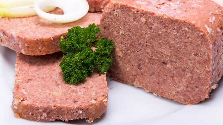 Canned corned beef on plate with garnish