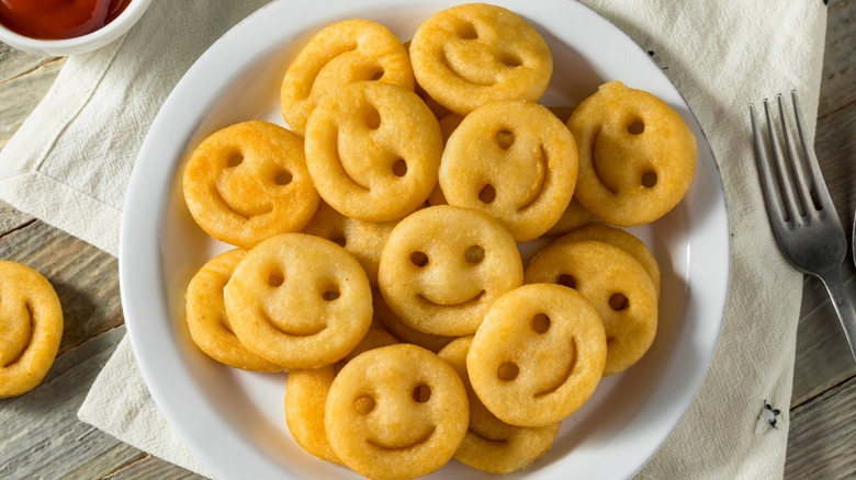 Smiley fries on a plate