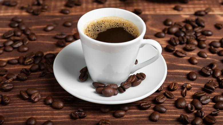 Cup of coffee and beans