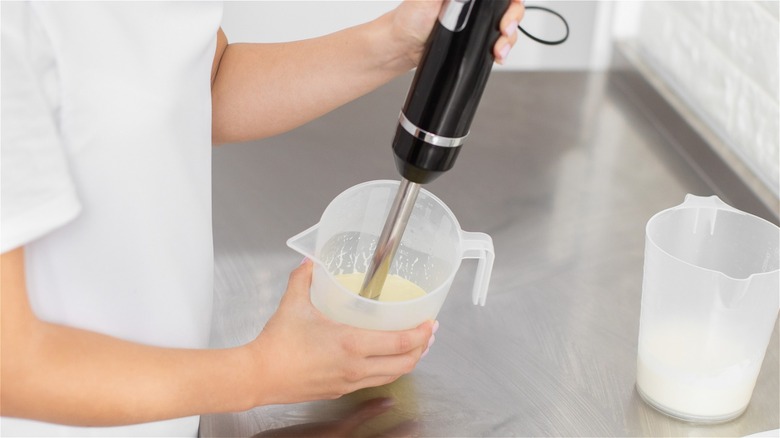 Immersion blender being used