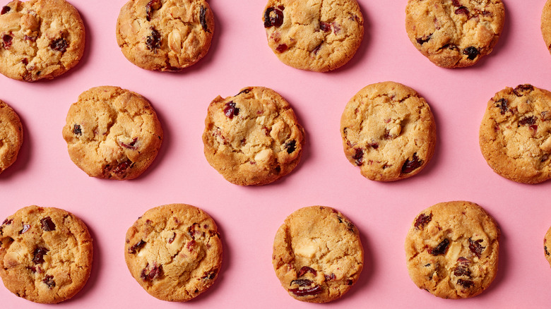 Fresh cookies on a pink background