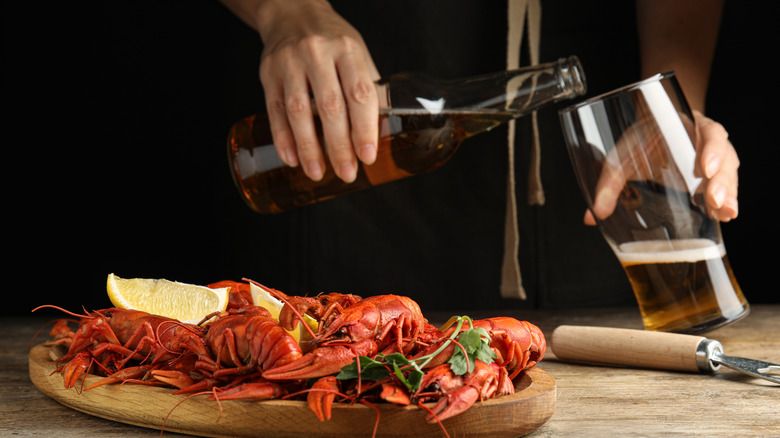 pouring beer crayfish in front