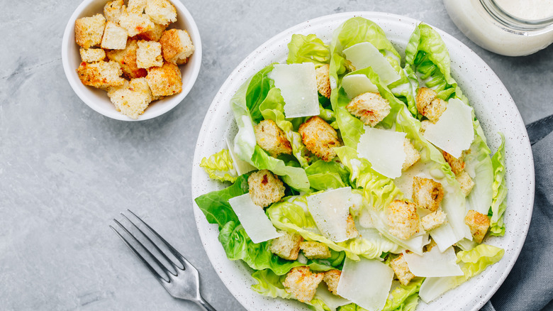 Caesar salad with croutons and dressing