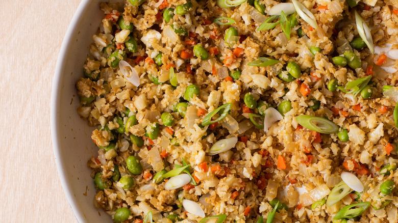 Vegetable fried cauliflower rice in a skillet