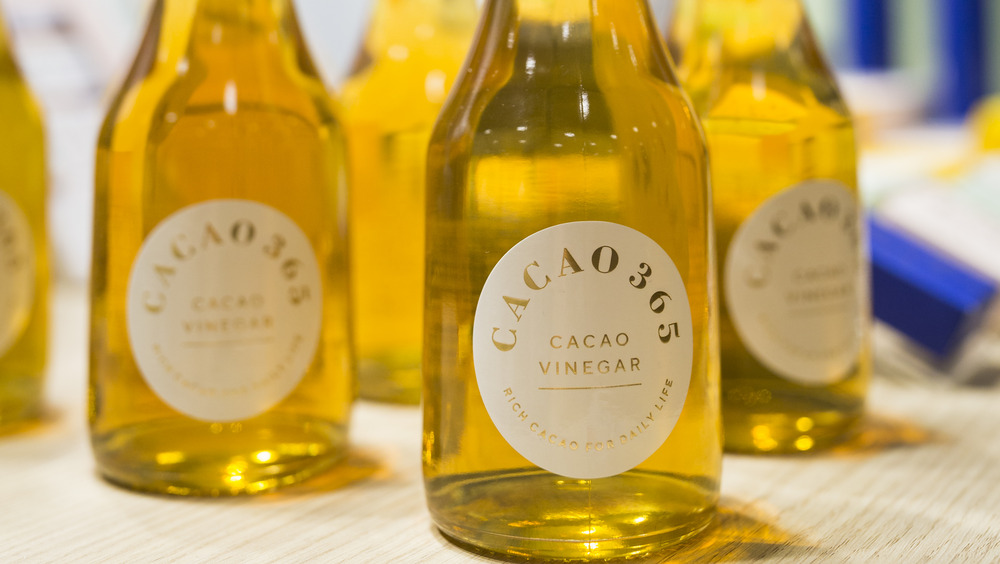 Bottles of cacao vinegar next to each other