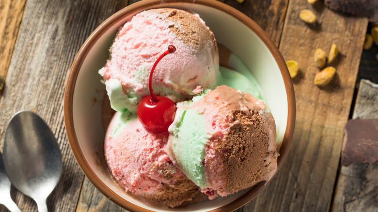 Bowl of spumoni with cherry on top