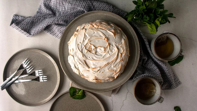 baked alaska with place settings and tea