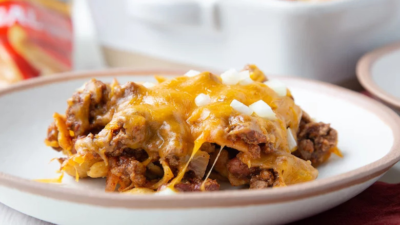 frito pie topped with cheese