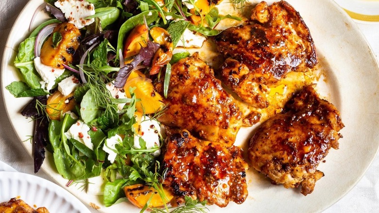 Jezebel chicken plated with a salad
