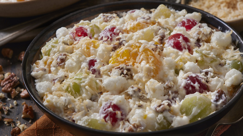 A heavenly hash or ambrosia salad with fruit, cream, and coconut