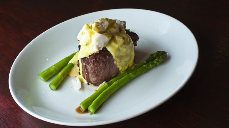 Steak Oscar on white plate