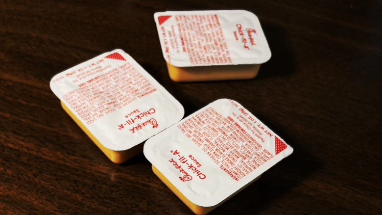 Chick-fil-A sauce packets on a table