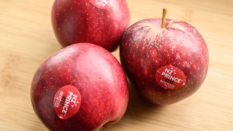 Red apples with PLU stickers