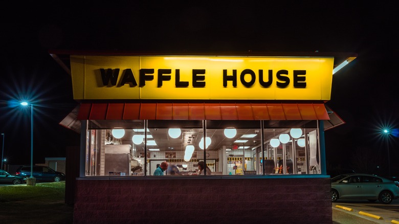 A Waffle House restaurant seen at night