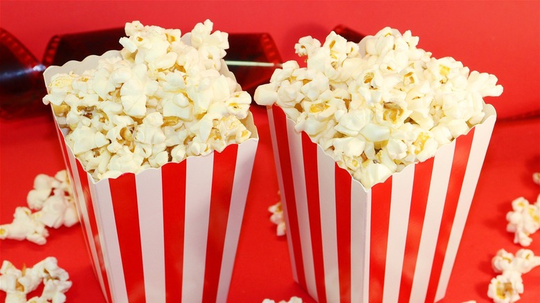 two red and white boxes of popcorn