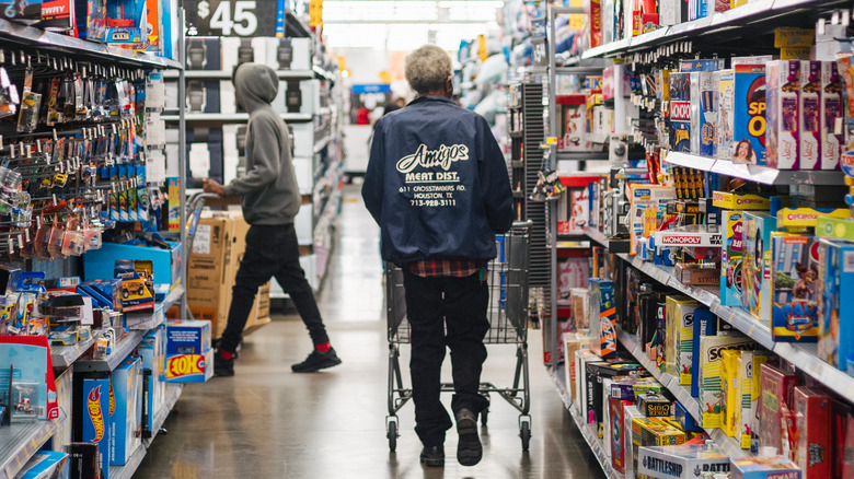 Customers shop at a Walmart store