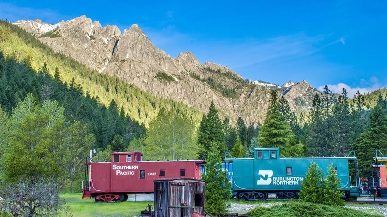 train cars at Jubilee Railroad with Castle Crags in background