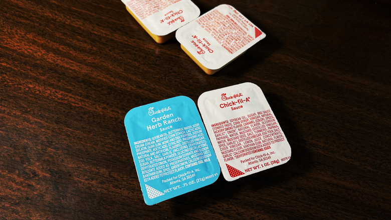 chick-fil-a sauce packets on table
