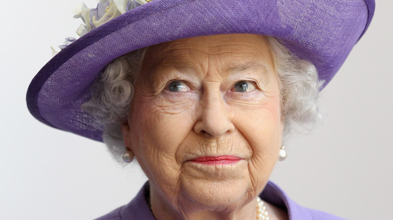 Queen Elizabeth II wearing purple